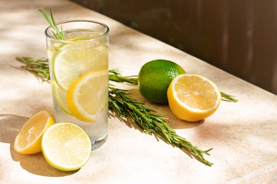 Summer refreshing lemonade and ingredients on light table