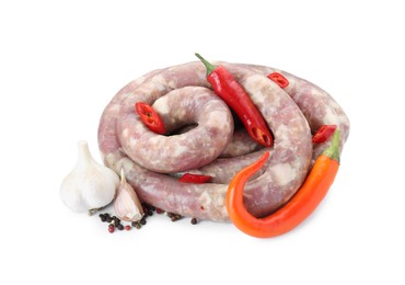 Photo of Homemade sausage, garlic, chili and peppercorns isolated on white