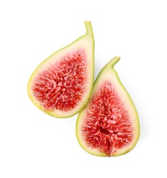 Photo of Halves of fresh green fig isolated on white, top view