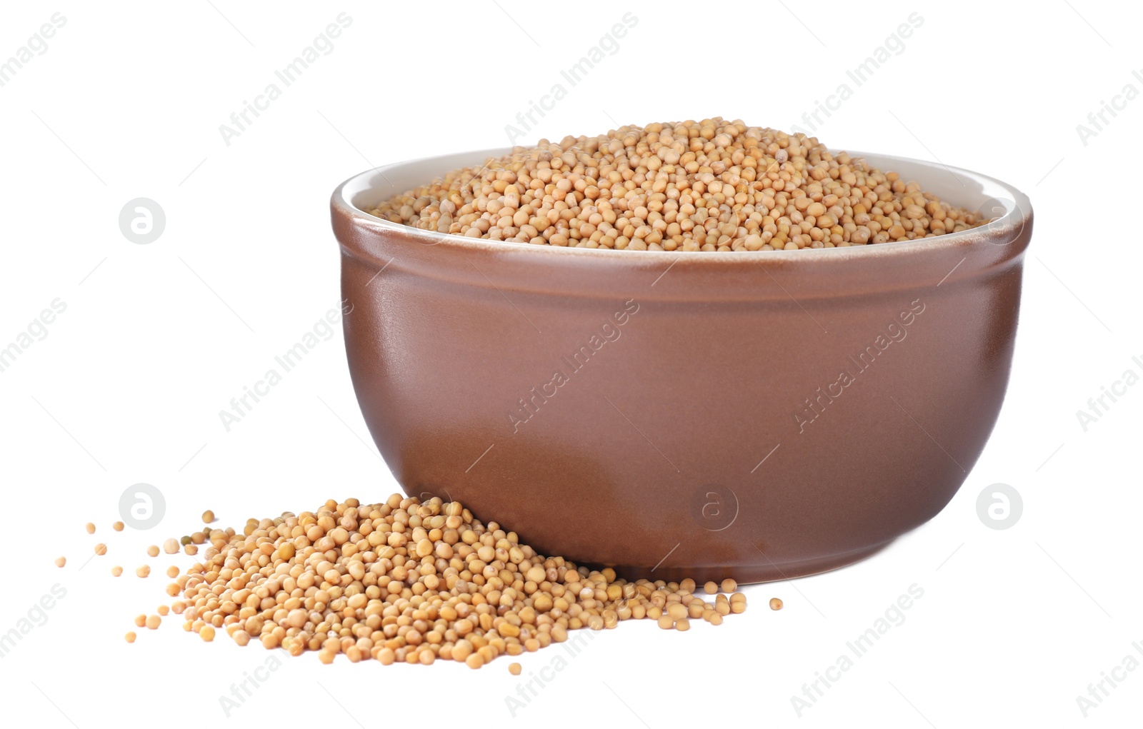 Photo of Mustard seeds with bowl isolated on white