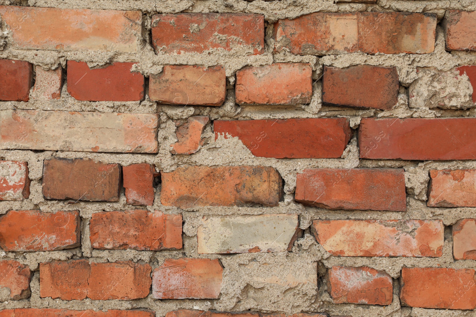 Photo of Texture of old red brick wall as background