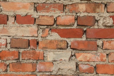 Photo of Texture of old red brick wall as background