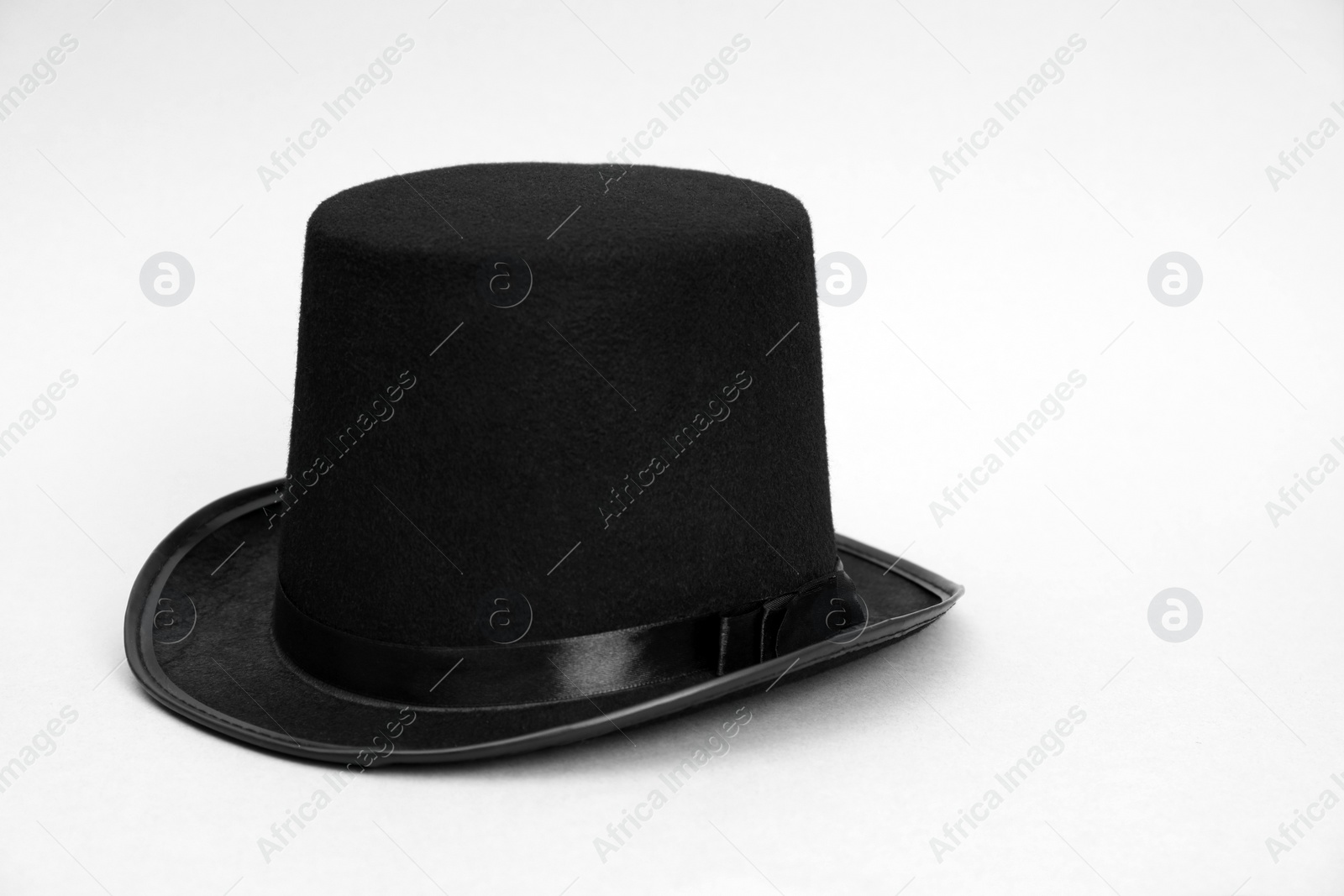 Photo of One magician top hat on white background