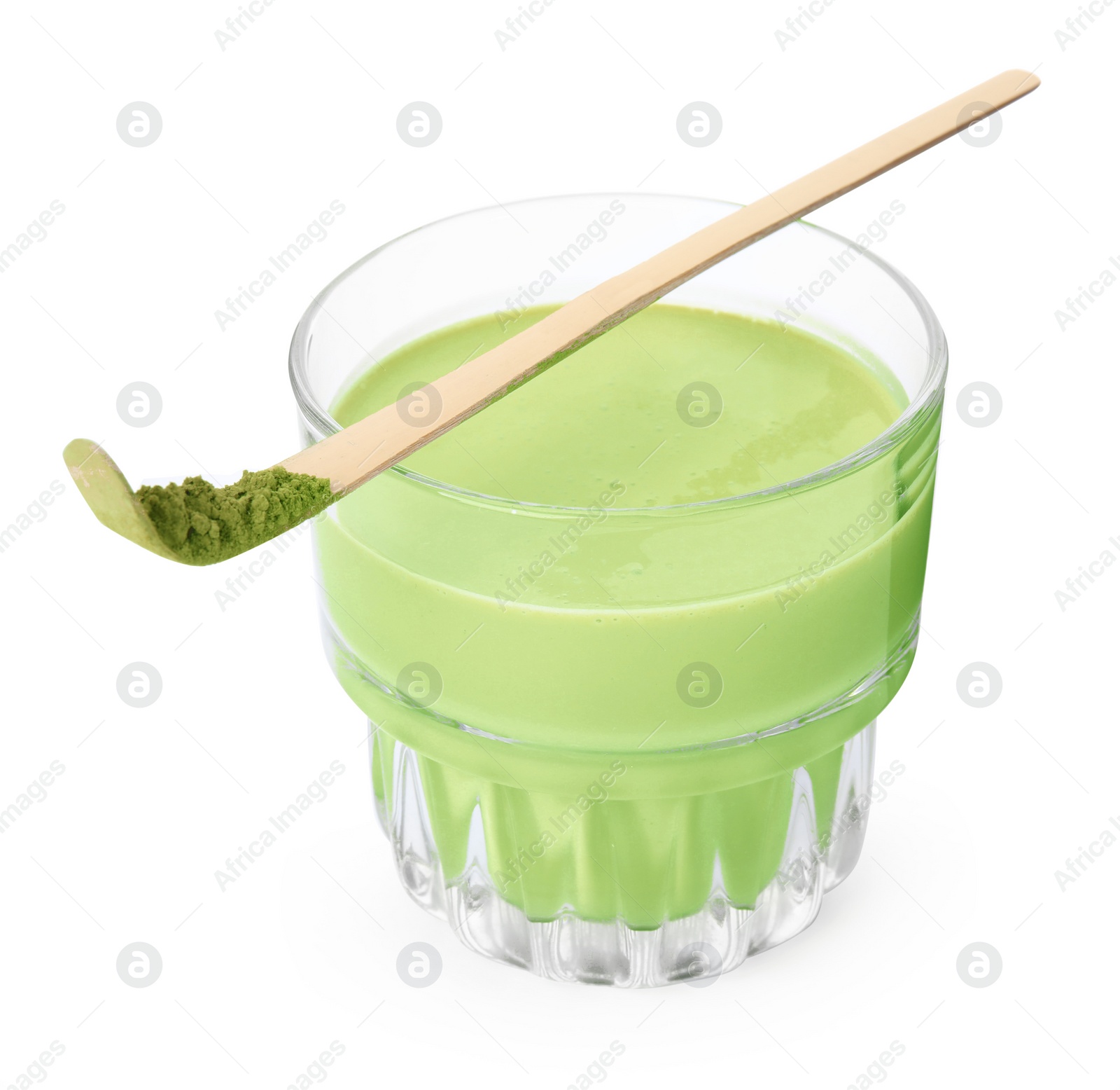 Photo of Glass of tasty matcha smoothie and bamboo spoon with powder isolated on white