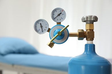 Photo of Medical oxygen tank in hospital room, closeup