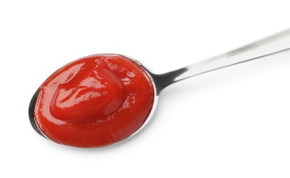 Photo of Tasty ketchup with spoon isolated on white, top view. Tomato sauce