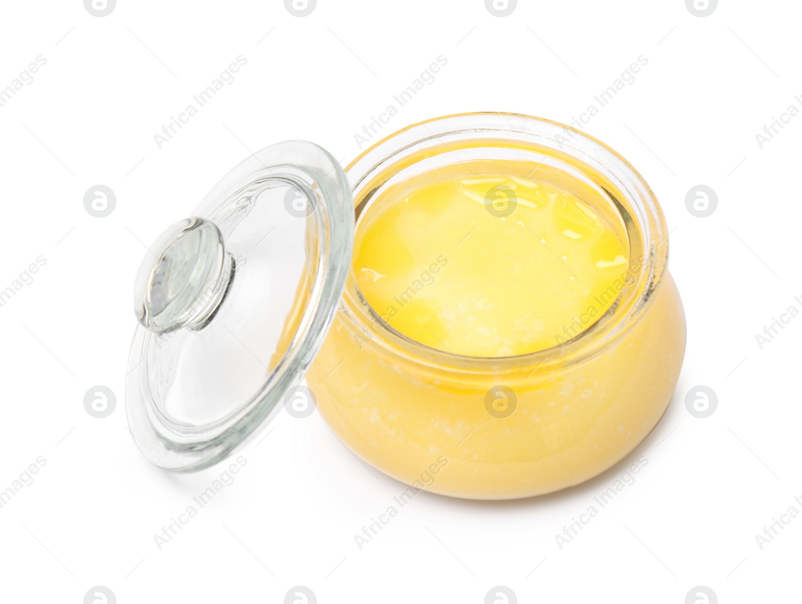 Photo of Glass jar with clarified butter on white background