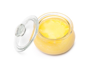 Photo of Glass jar with clarified butter on white background