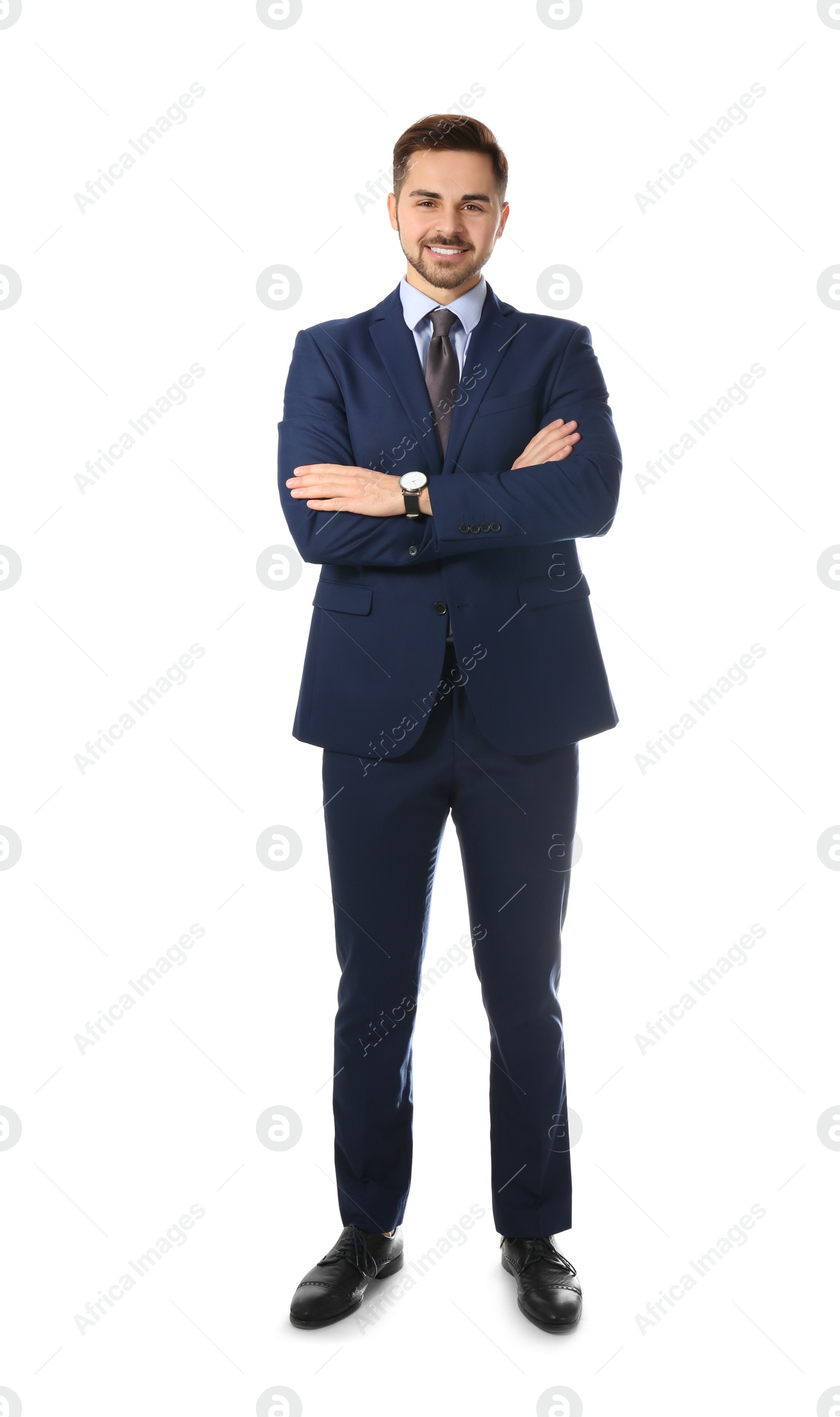 Photo of Full length portrait of businessman posing on white background