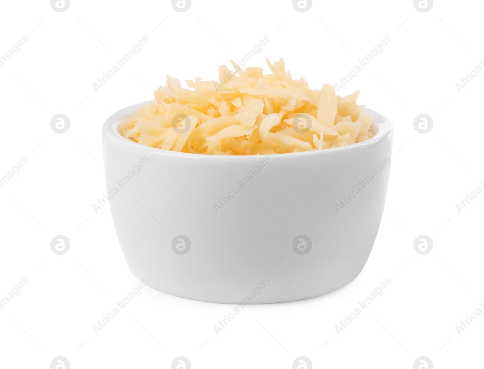 Photo of Tasty grated cheese in bowl isolated on white