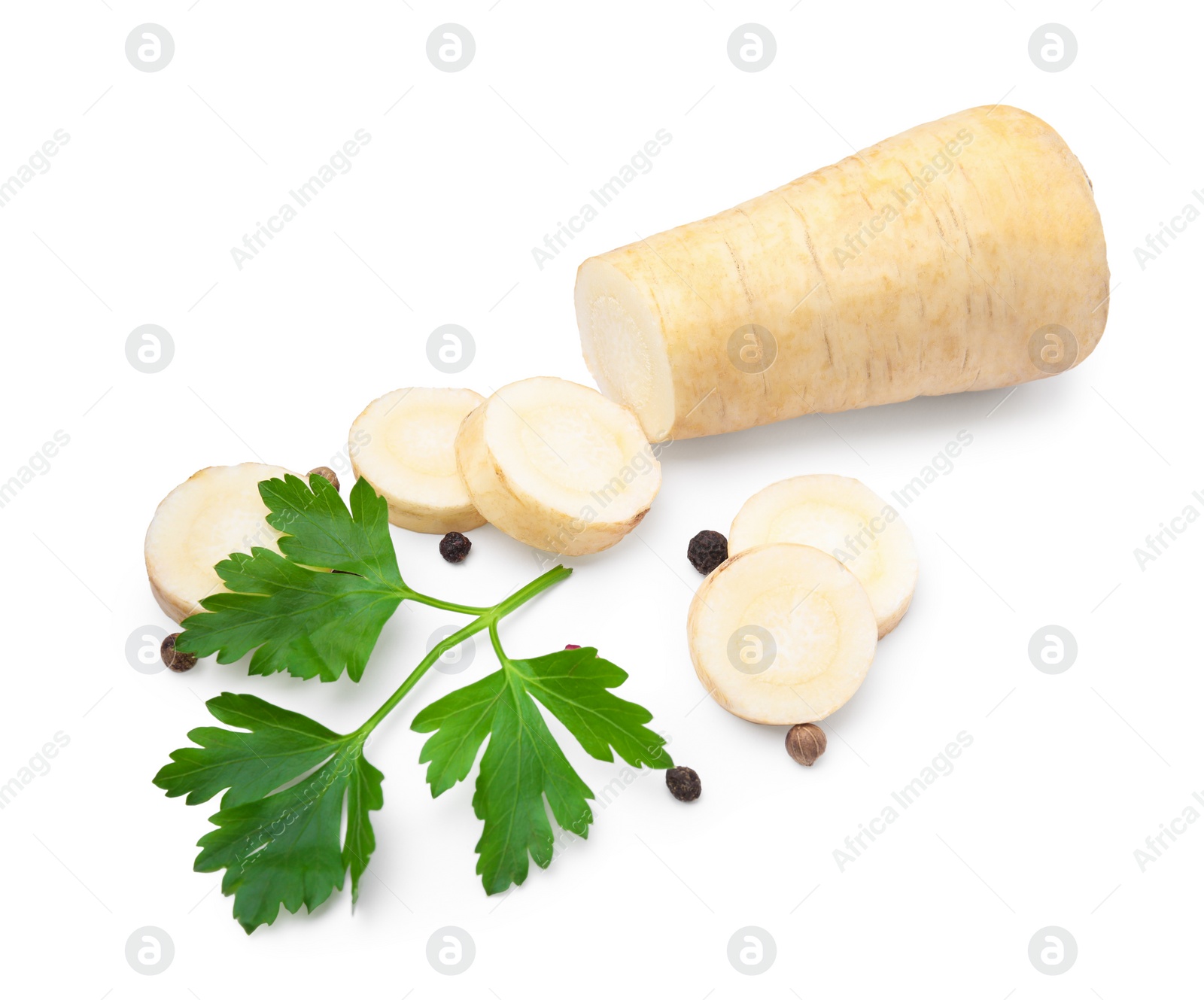 Photo of Whole and cut raw parsley root, fresh herb isolated on white