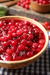 Fresh cranberry sauce served in bowl, closeup
