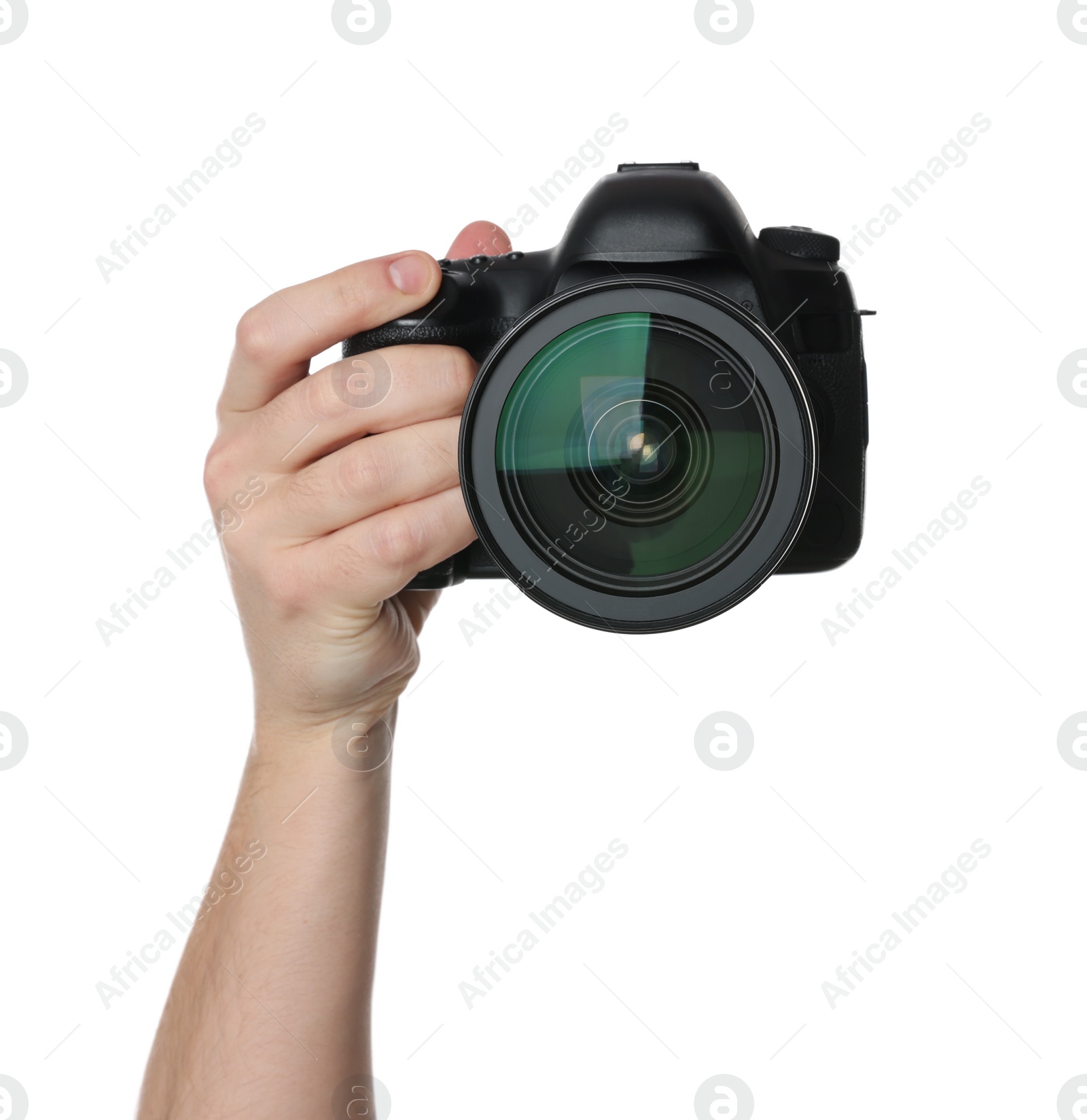 Photo of Photographer holding modern camera on white background, closeup