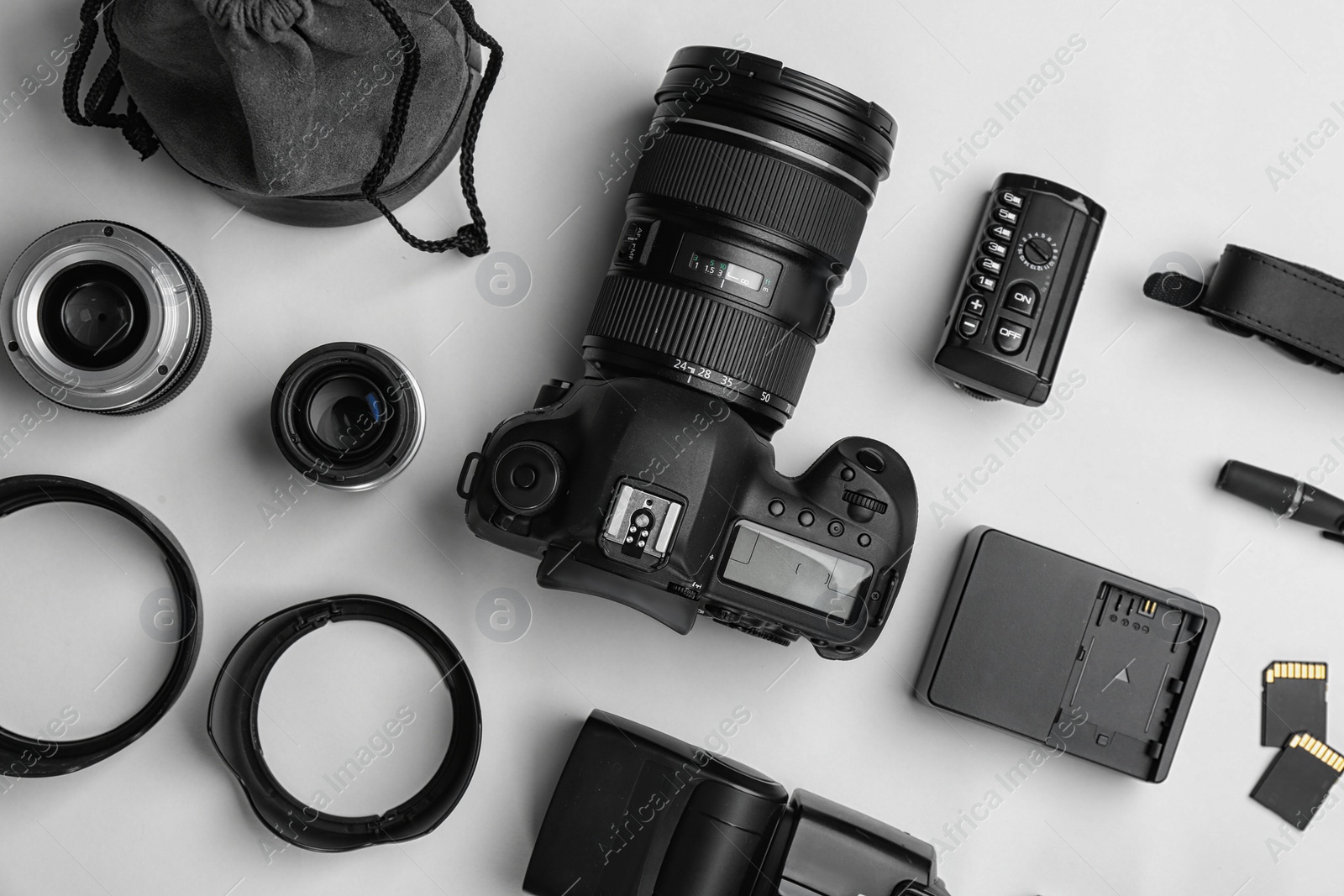 Photo of Flat lay composition with photographer's equipment and accessories on white background