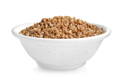 Photo of Bowl of buckwheat porridge isolated on white