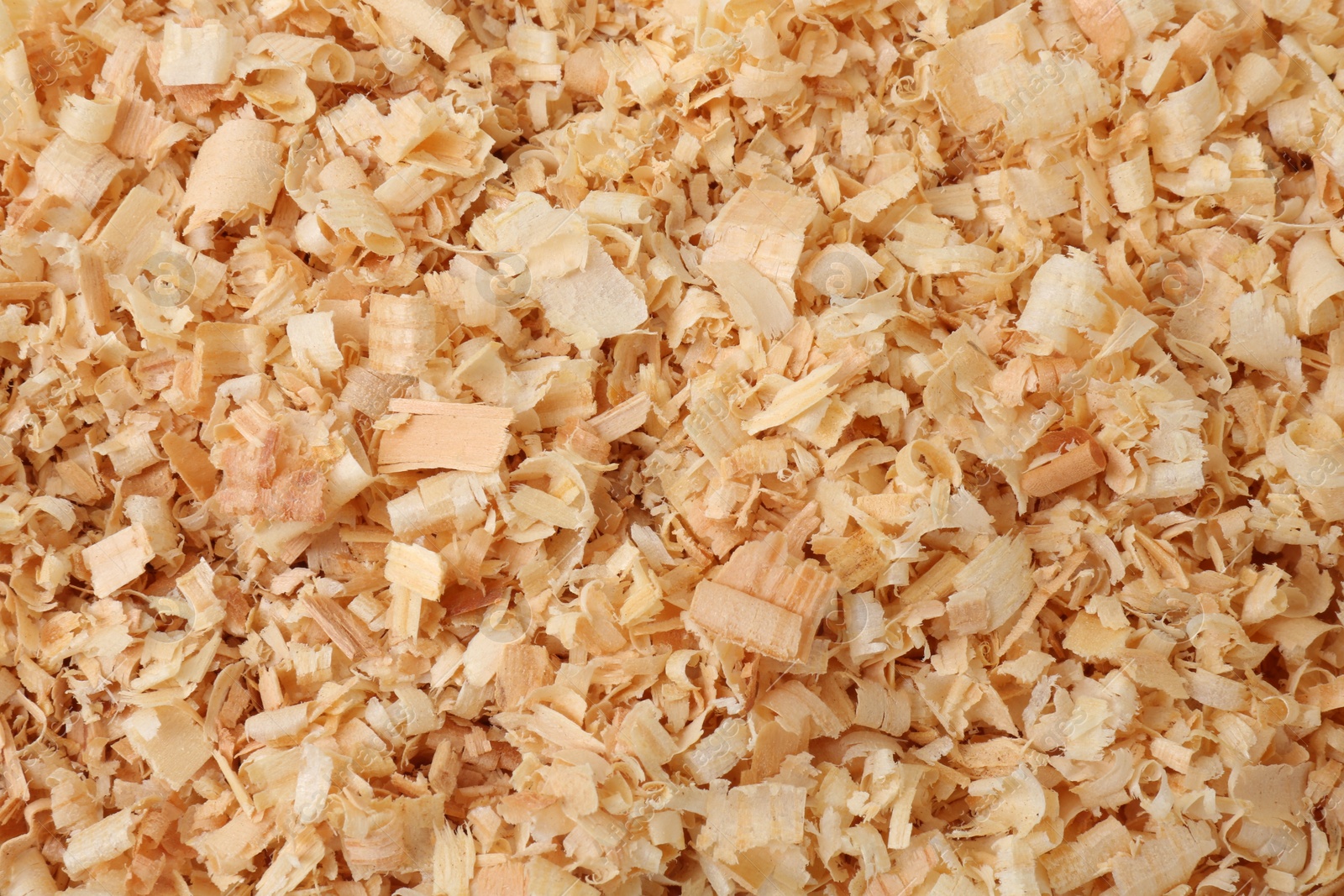Photo of Pile of natural sawdust as background, top view
