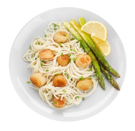 Photo of Delicious scallop pasta with asparagus, green onion and lemon isolated on white, top view