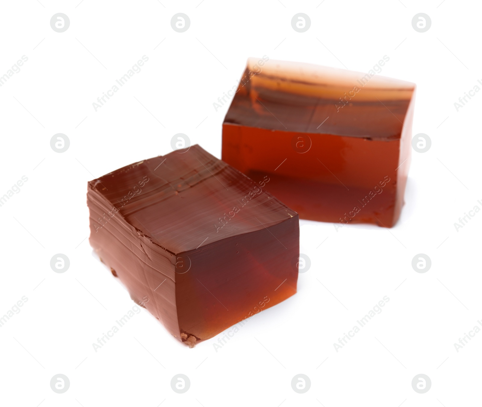 Photo of Delicious grass jelly cubes on white background