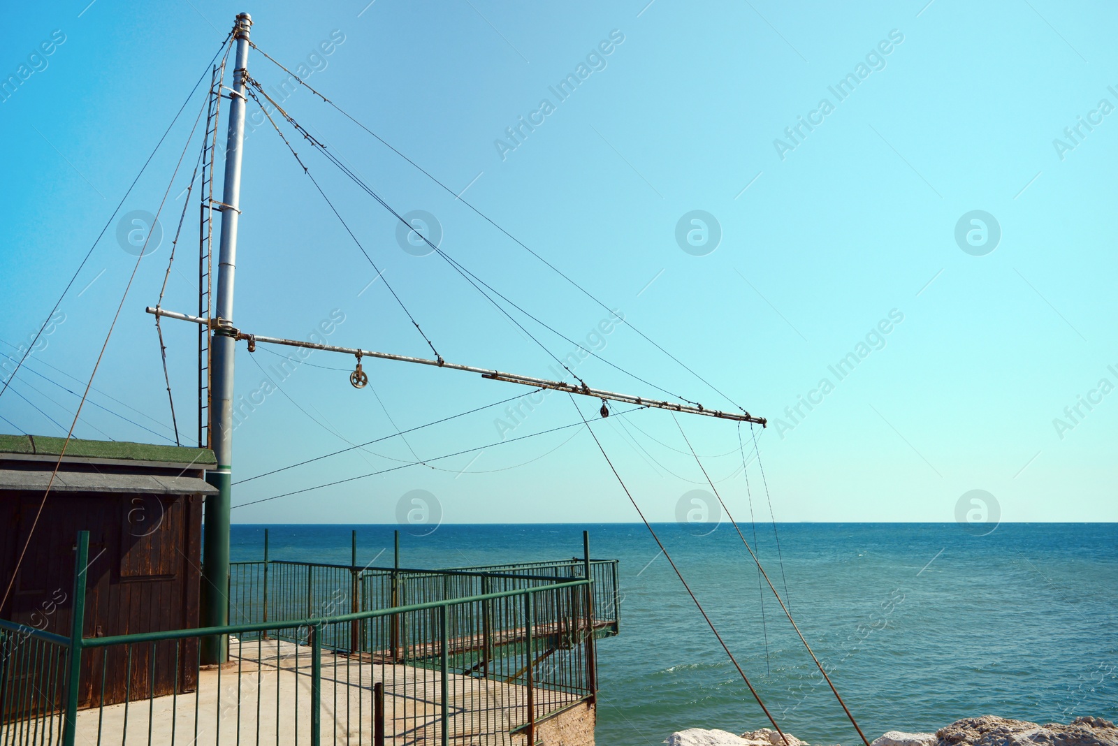 Photo of Shore operated stationary lift net on coast