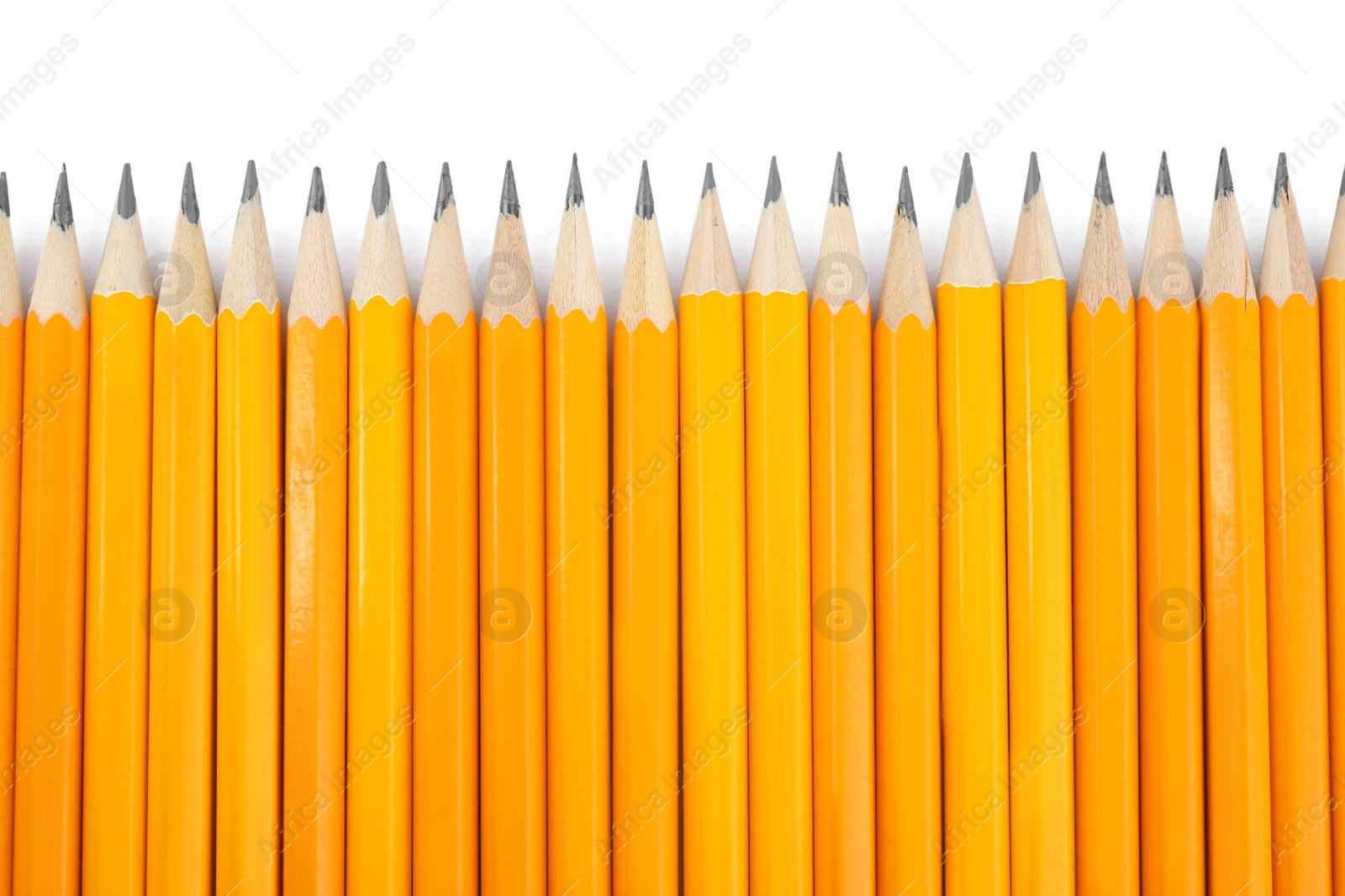 Photo of Many sharp pencils isolated on white, top view