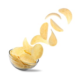 Image of Fried crispy potato chips falling into bowl on white background