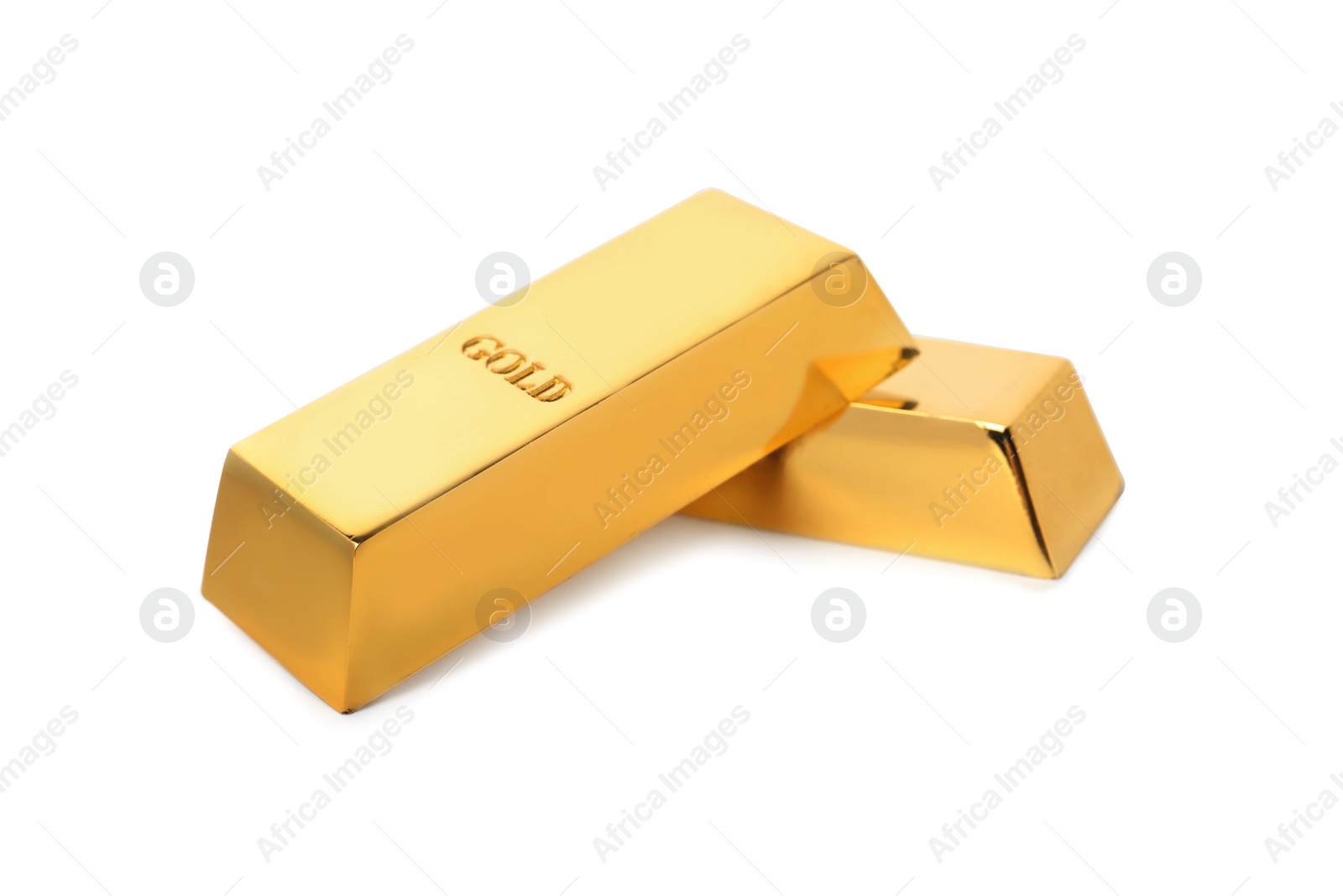 Photo of Precious shiny gold bars on white background