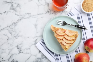 Photo of Freshly baked delicious apple pie served on white marble table, flat lay. Space for text