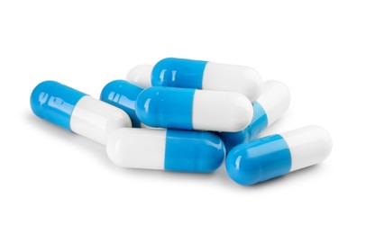 Photo of Pile of antibiotic pills isolated on white