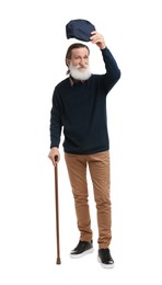 Senior man with walking cane on white background