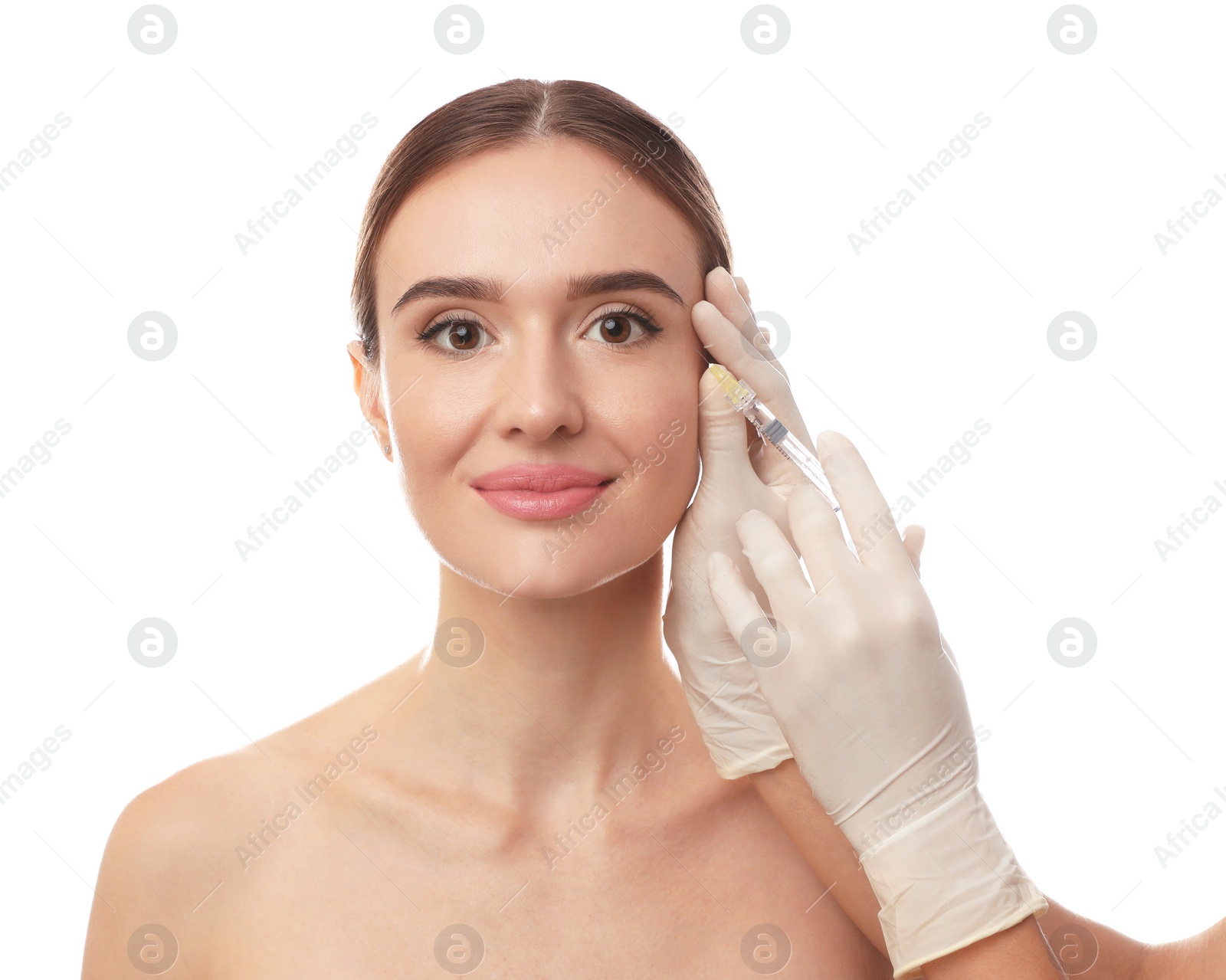 Photo of Beautiful woman getting facial injection on white background. Cosmetic surgery