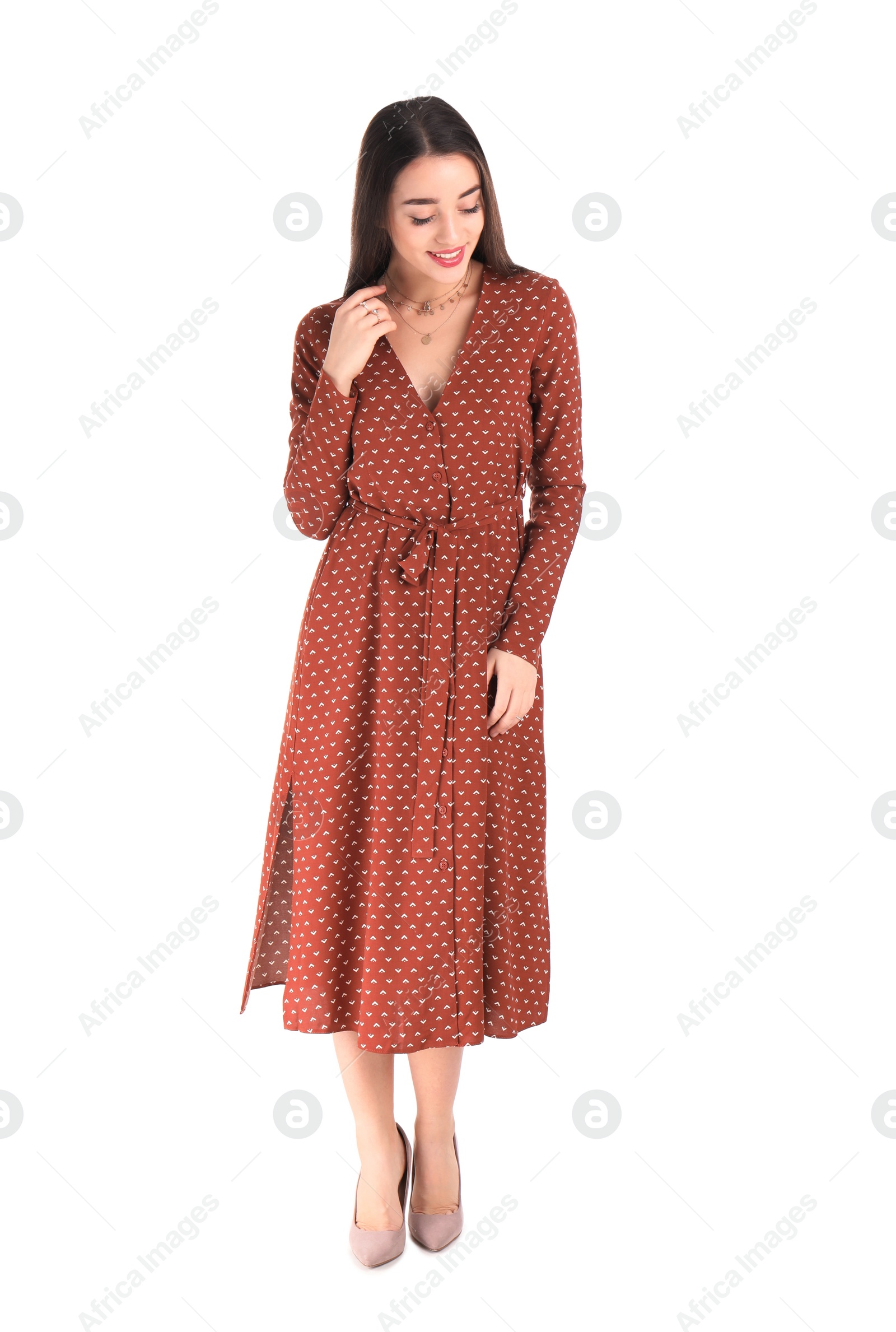 Photo of Portrait of beautiful young woman in stylish dress on white background