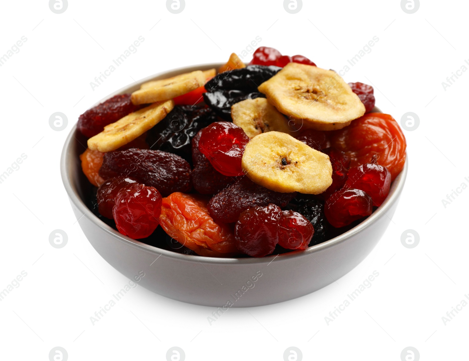 Photo of Mix of delicious dried fruits in bowl isolated on white