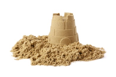 Photo of Pile of sand with beautiful castle isolated on white. Outdoor play