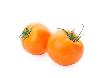 Photo of Delicious ripe orange tomatoes on white background