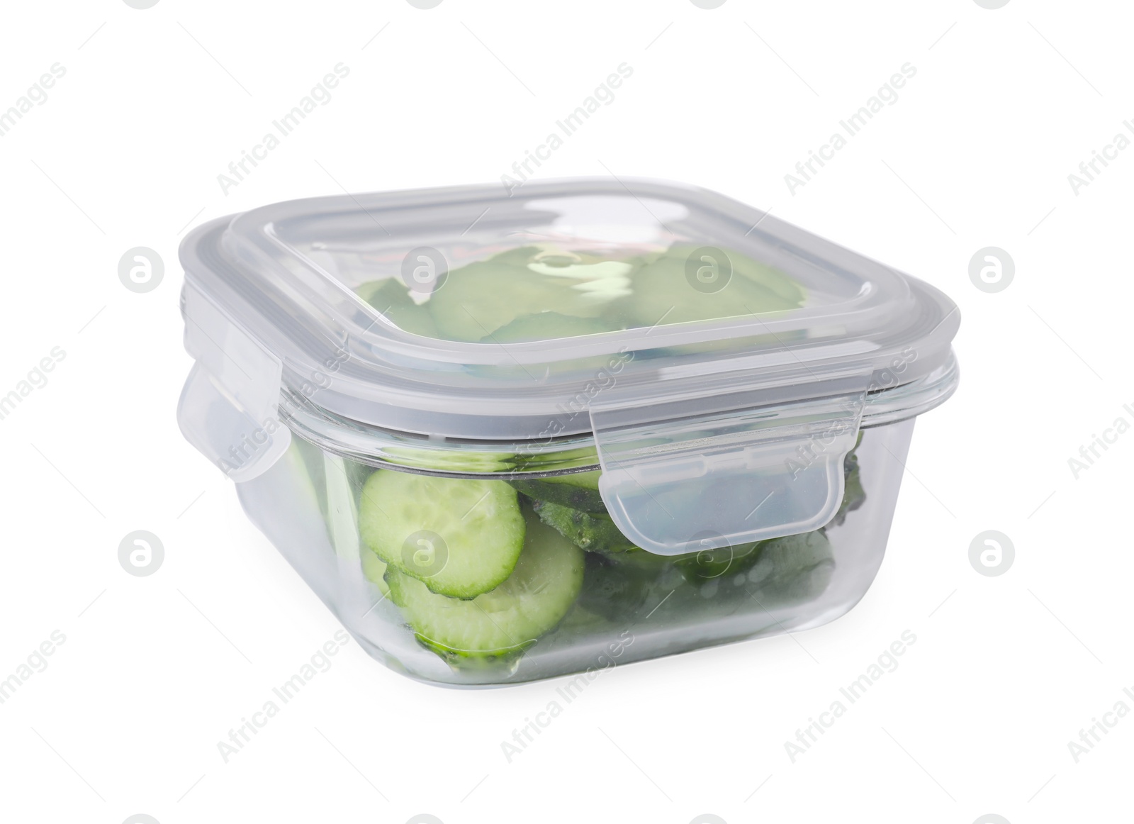 Photo of Glass container with fresh cut cucumbers isolated on white