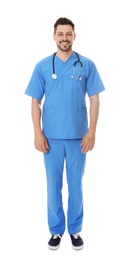 Photo of Full length portrait of smiling male doctor in scrubs isolated on white. Medical staff