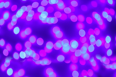 Photo of Beautiful glowing lights as background. Bokeh effect