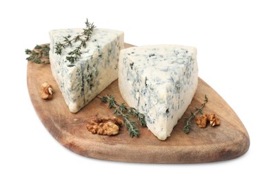 Photo of Tasty blue cheese with thyme and walnuts isolated on white