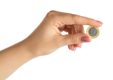 Woman holding one coin against white background, closeup