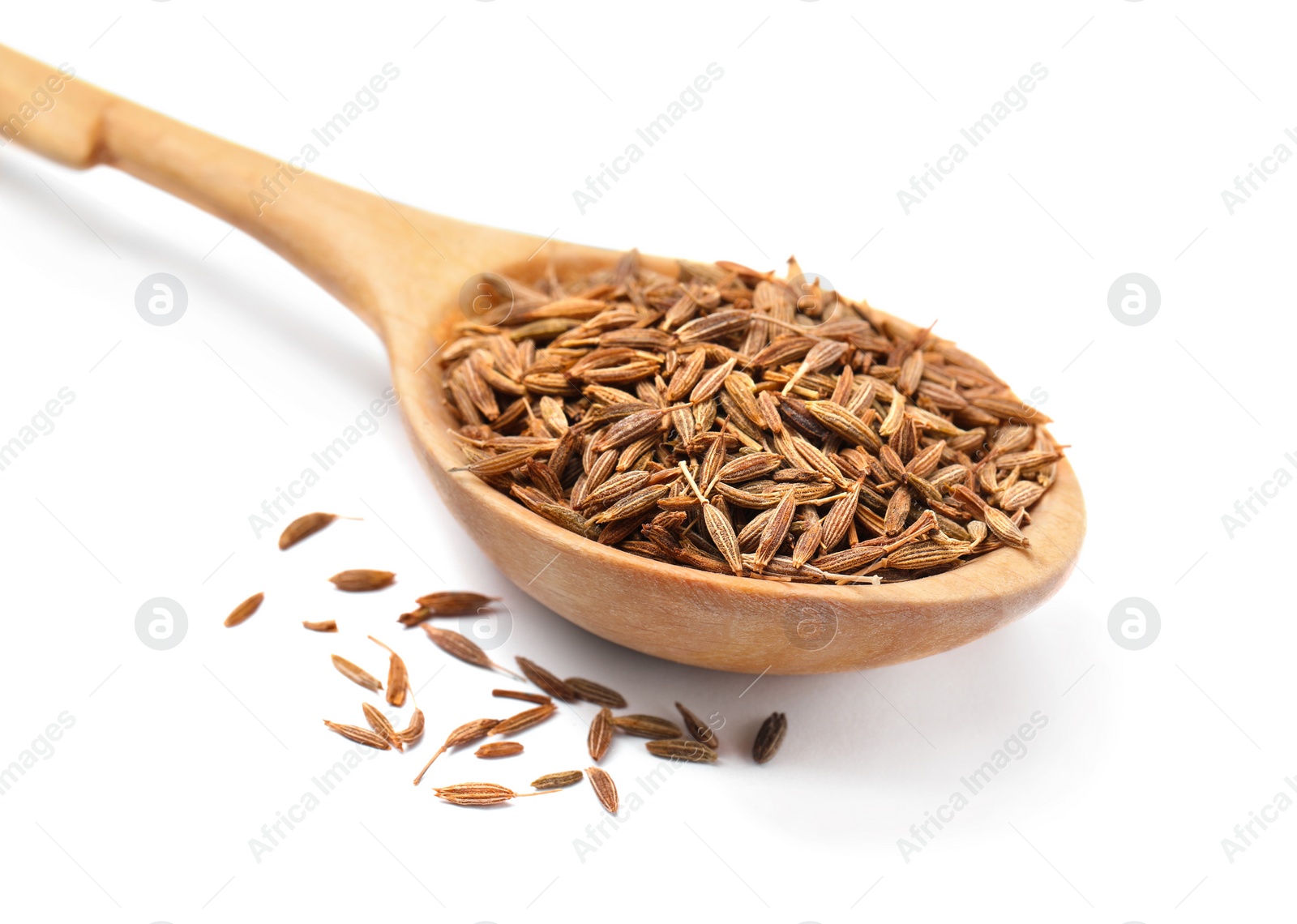 Photo of Spoon of aromatic caraway (Persian cumin) seeds isolated on white