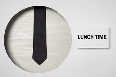 Image of Creative business lunch layout with tie and card, flat lay
