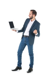 Emotional businessman in office wear with laptop celebrating victory on white background