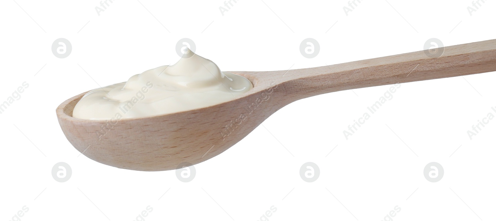 Photo of One wooden spoon with mayonnaise isolated on white