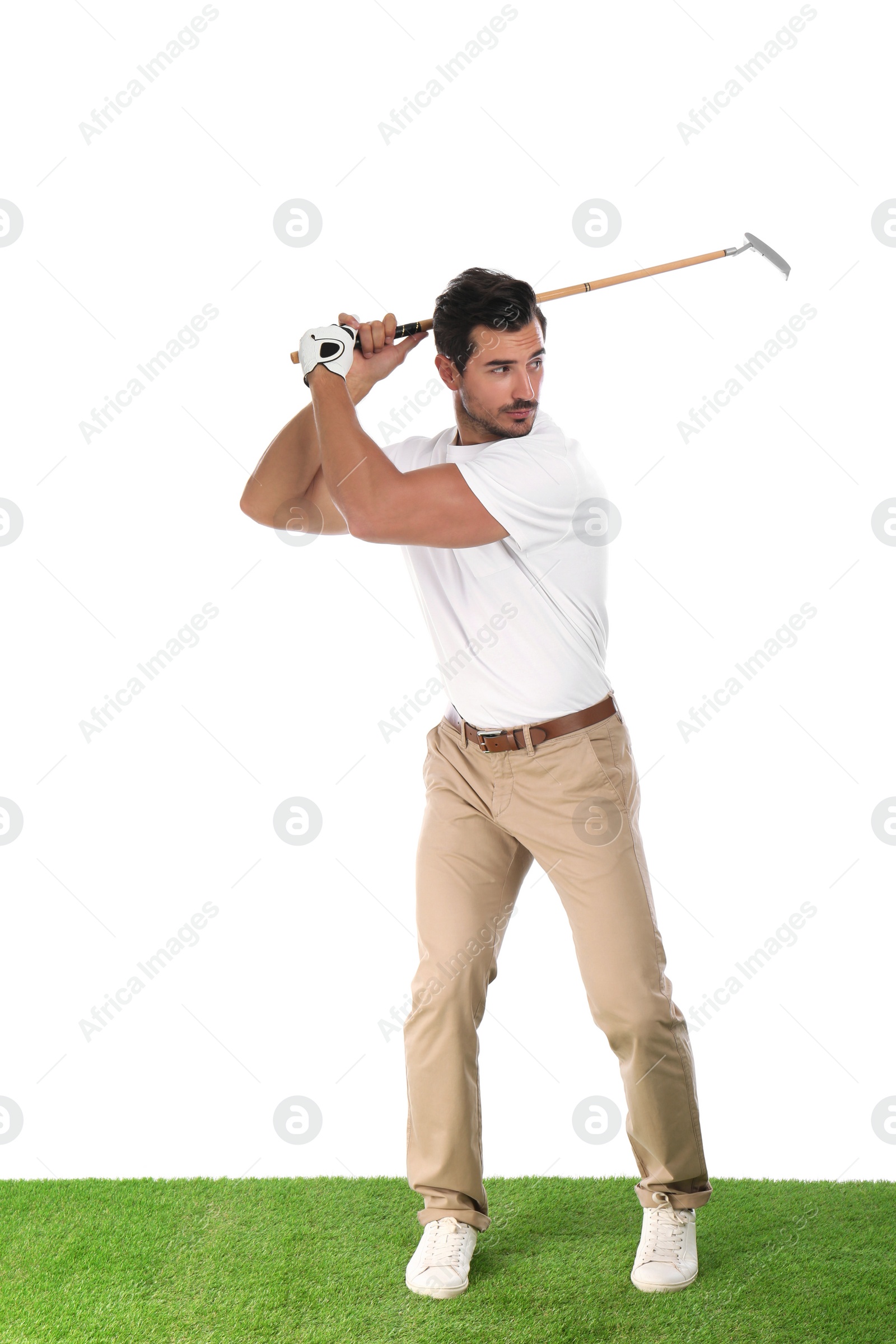 Photo of Young man playing golf on white background