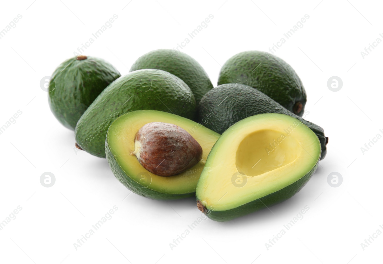 Photo of Ripe avocados on white background. Tropical fruit