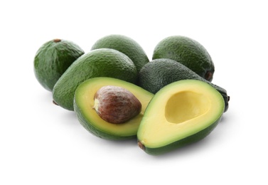 Ripe avocados on white background. Tropical fruit