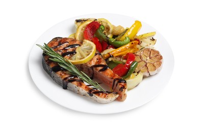 Photo of Tasty salmon steak with sauce, lemon and vegetables on white background