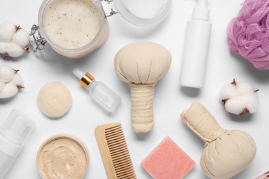 Bath accessories. Flat lay composition with personal care products on white background