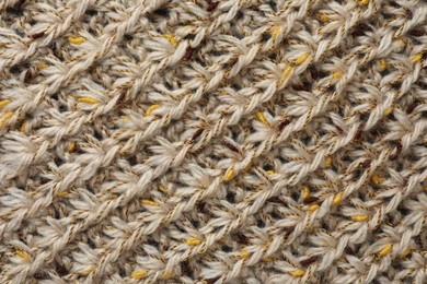 Photo of Texture of knitted fabric as background, top view