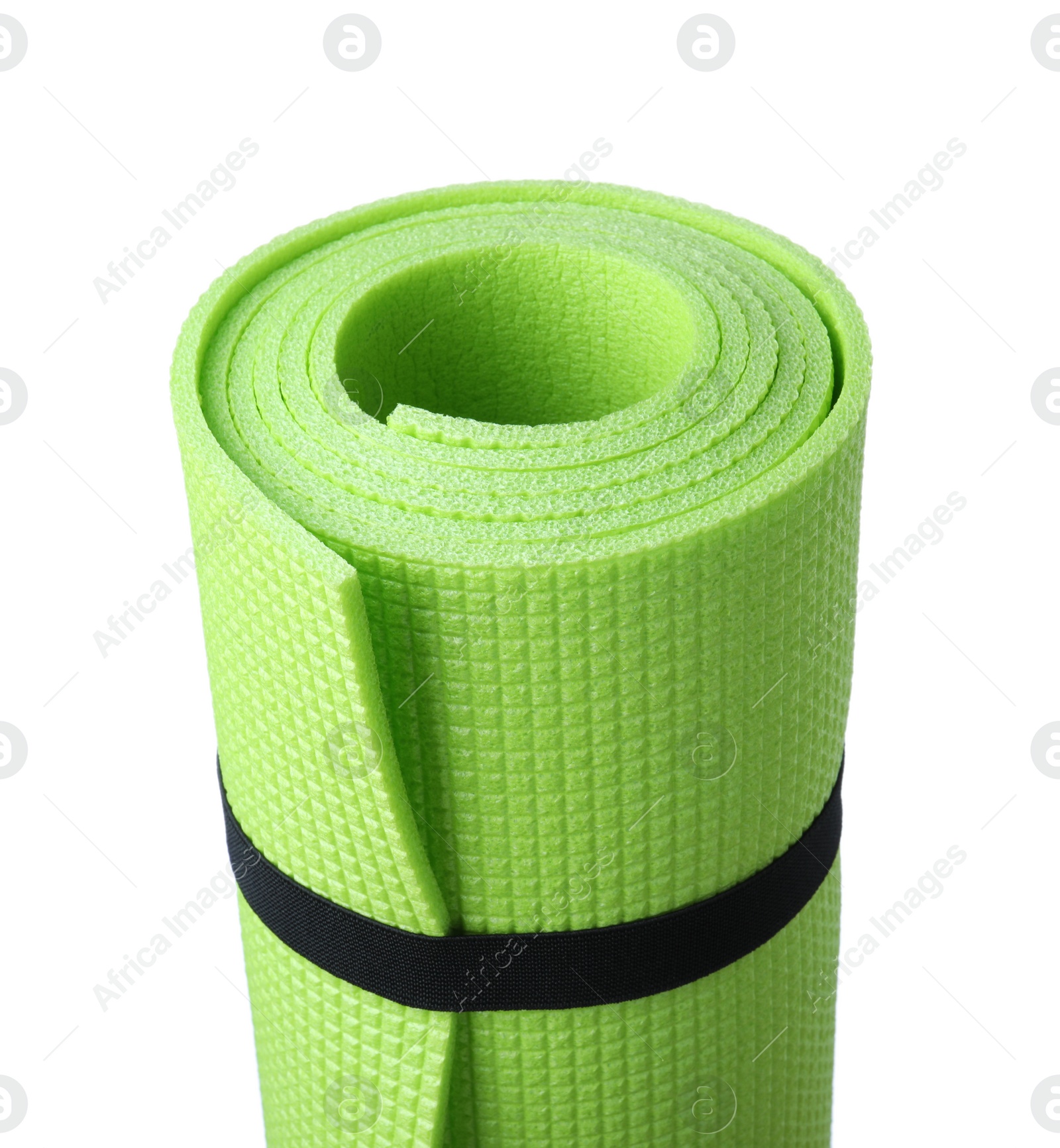 Photo of Rolled camping mat on white background, closeup